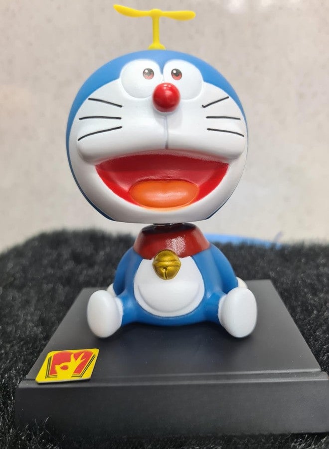 سلسلة مفاتيح مميزة، مجسم هزاز للوحة القيادة في السيارة مع حامل للهاتف المحمول، ديكور منزلي ومكتبي (دوريمون)